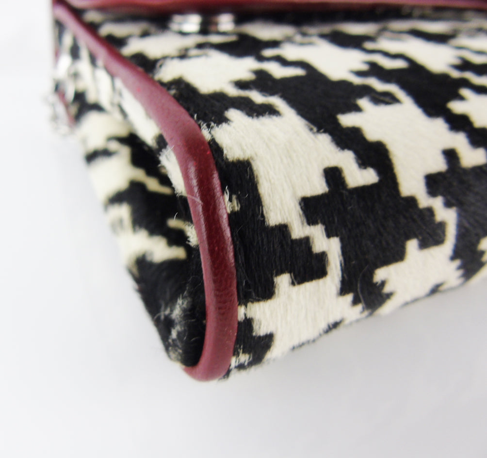 CHRISTIAN LOUBOUTIN    Pony Hair Dogtooth Riviera Clutch