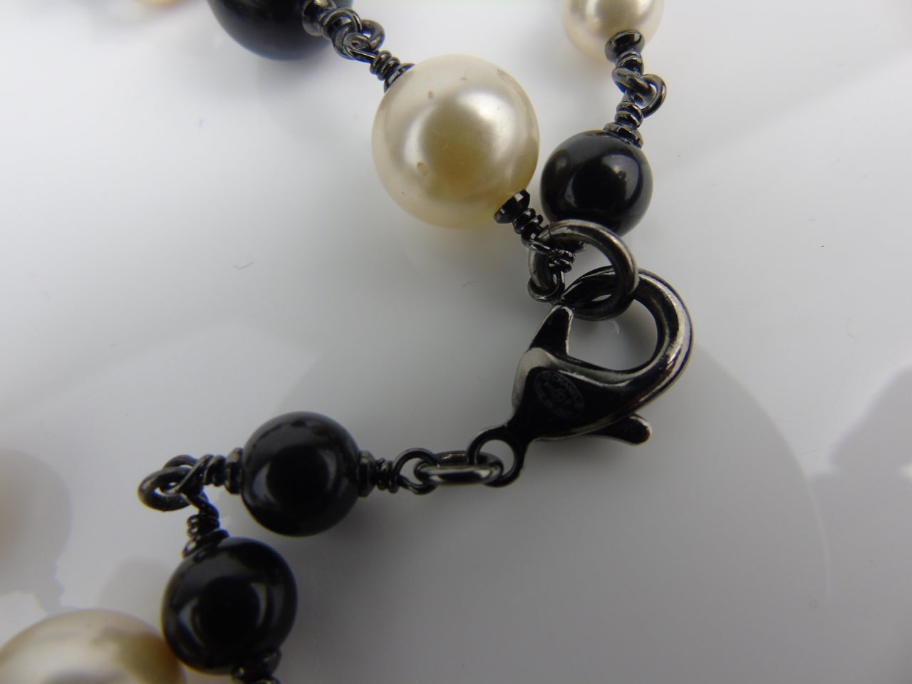 CHANEL Long Pearl Sautoir Necklace with Camellia CC logos