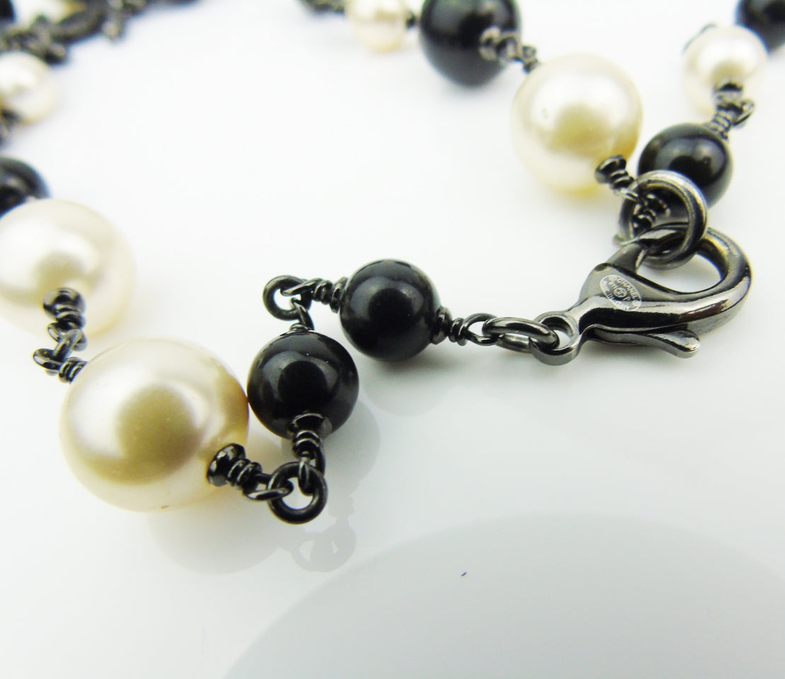 CHANEL Long Pearl Sautoir Necklace with Camellia CC logos