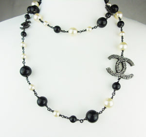 CHANEL Long Pearl Sautoir Necklace with Camellia CC logos