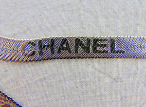 CHANEL stunning silver multi logo metal belt with cc clasp