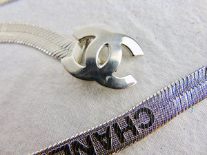 CHANEL stunning silver multi logo metal belt with cc clasp