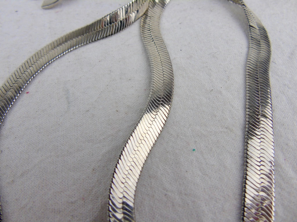 CHANEL stunning silver multi logo metal belt with cc clasp