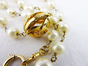 CHANEL Long Pearl Necklace with CC logos - vintage